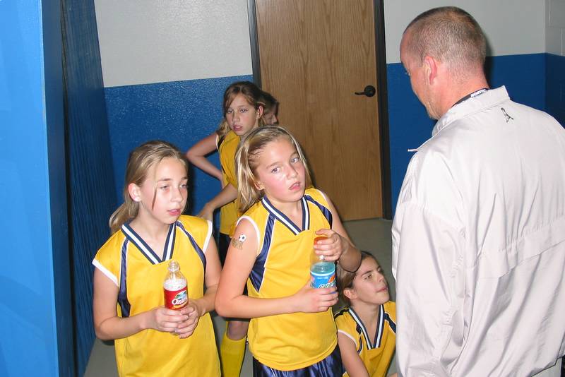 The girls are hot and sweaty after a tough loss.