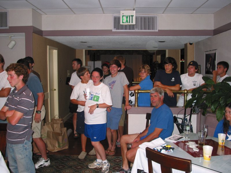 A soccer team comes in to check out the auction