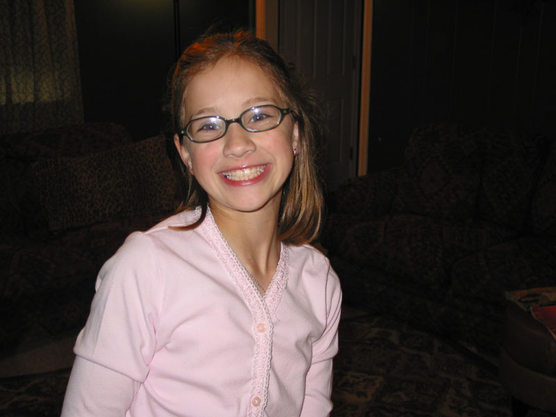 Holly practicing her fake smile. (She's getting pretty good!)
