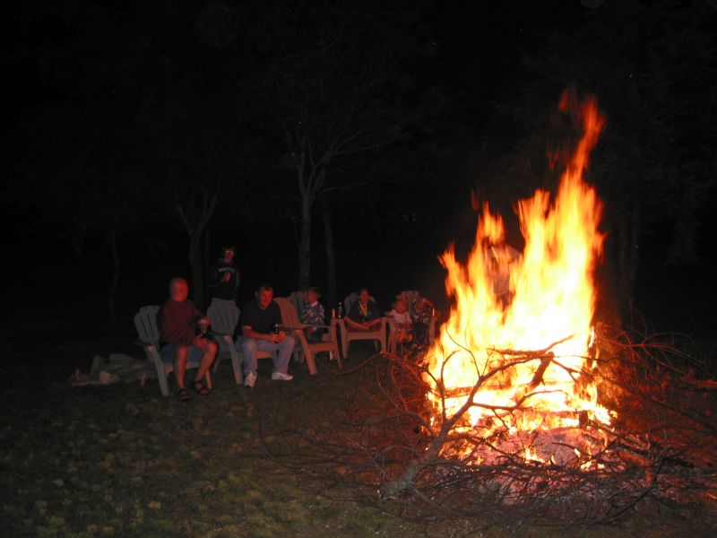 As the fire dies down a bit, we start to relax around it.