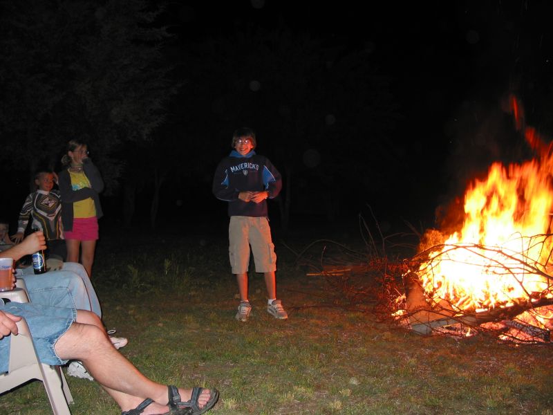 Andrew shows that even with a fire, we had to bundle up a bit.