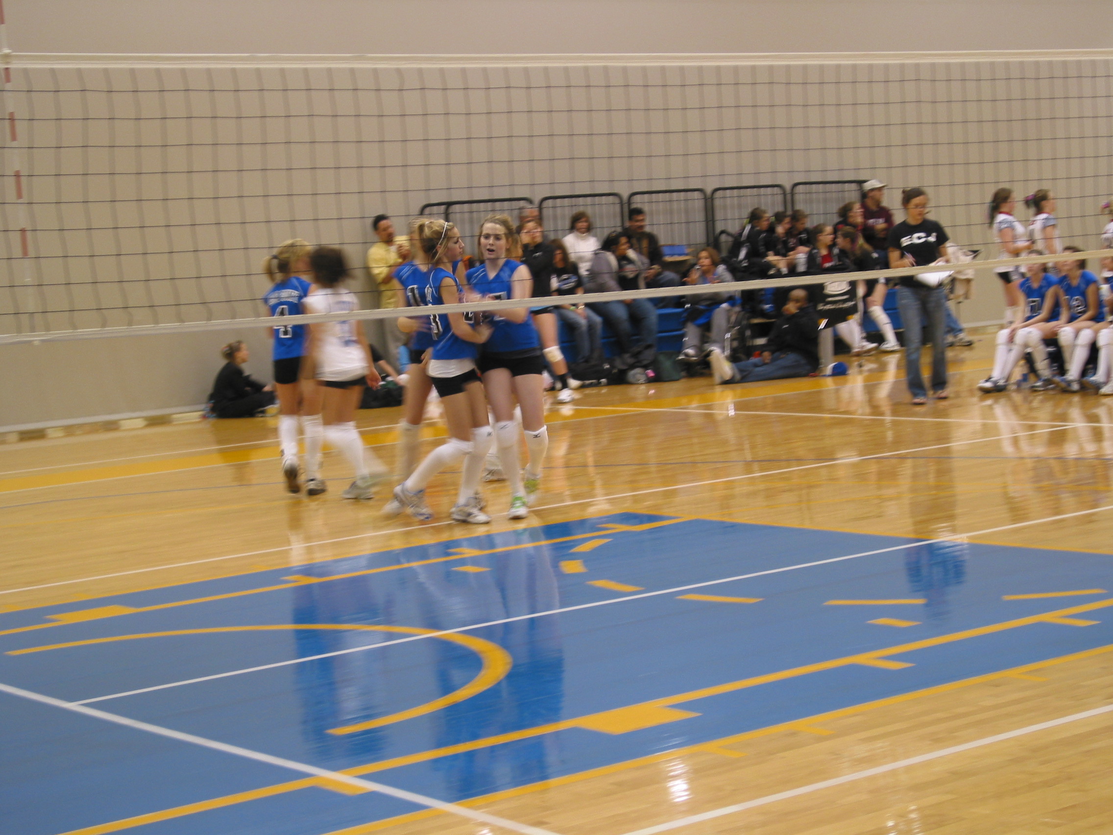 Holly and Logan celebrate after a point