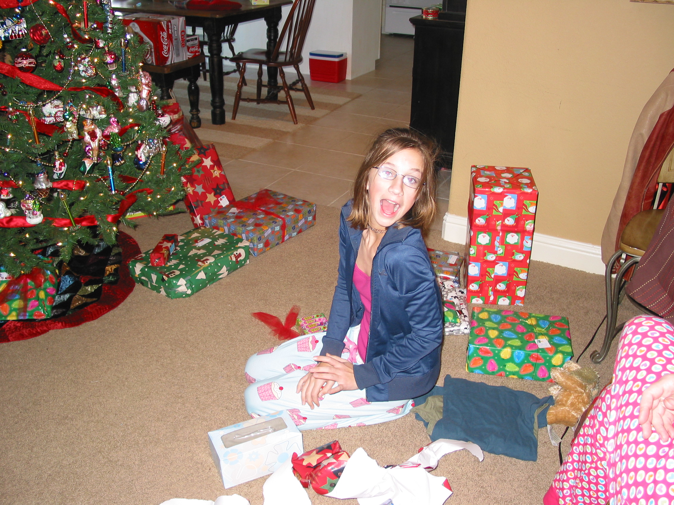 Holly is starting to open gifts
