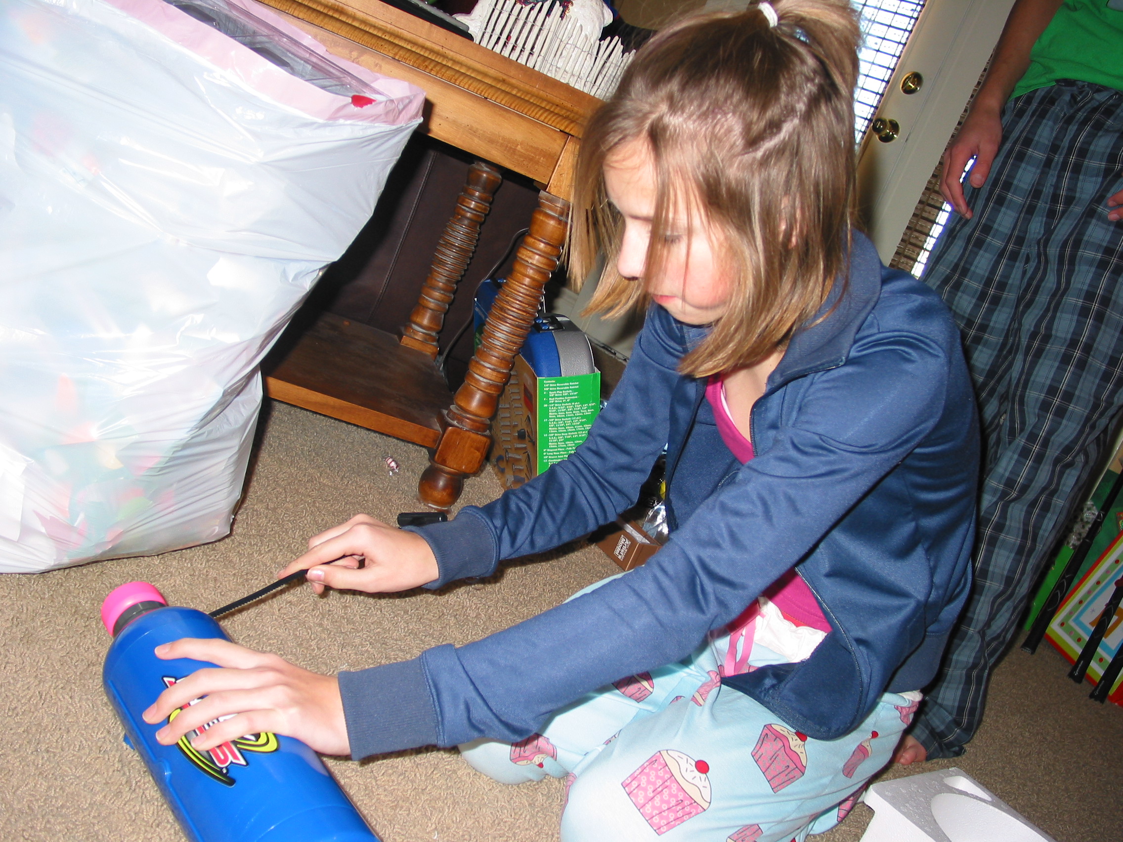 Holly tries out her present to Andrew