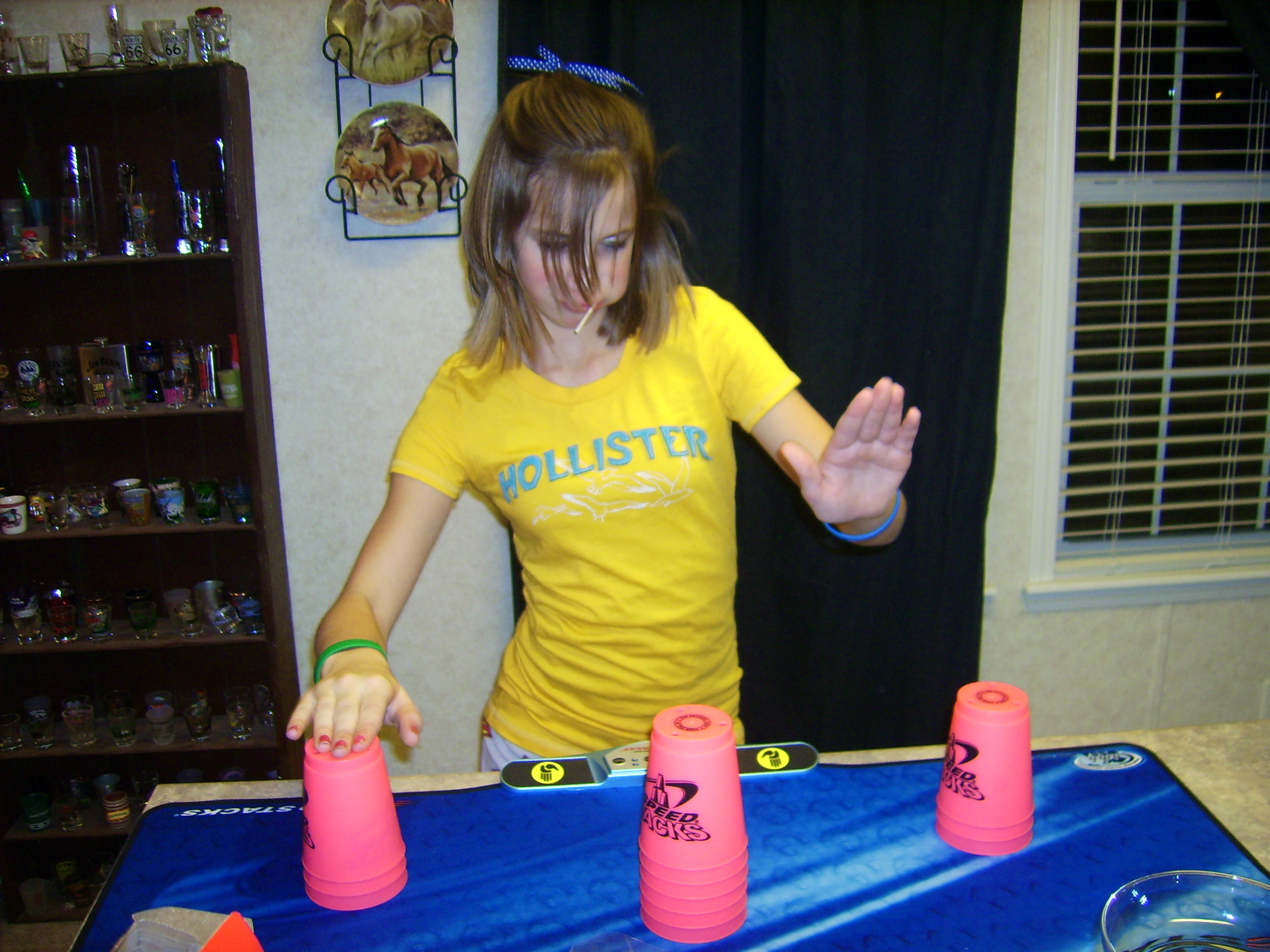 Holly is honing her cup-stacking skills