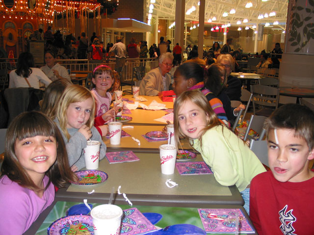 Having a Birthday Cookie at the Food Court