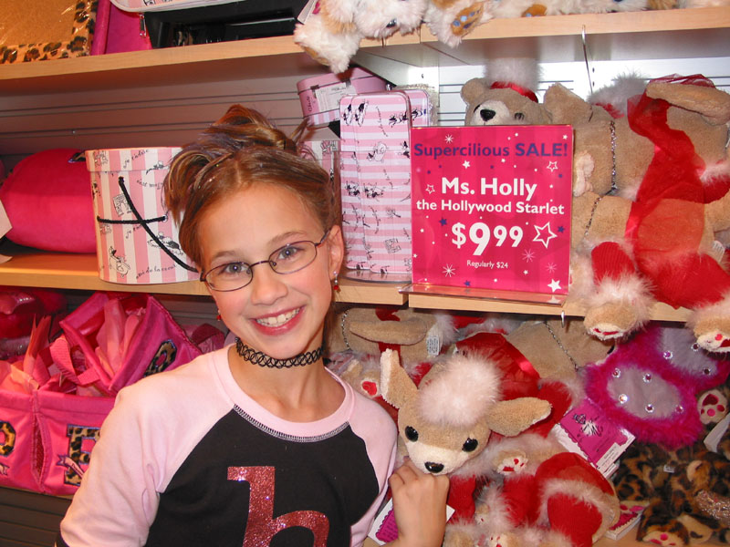 Holly with a "Ms. Holly" doll.