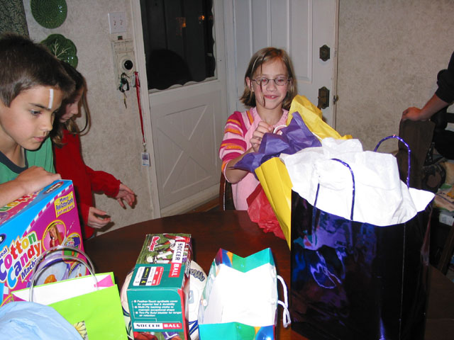 Andrew tries to decide if any of the presents will be any fun for him