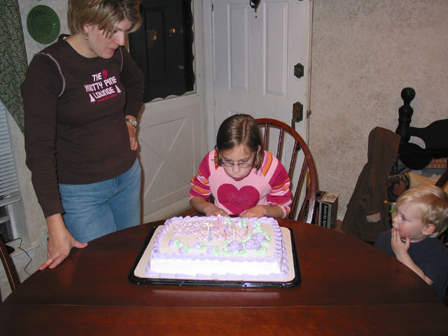Holly blowing out the candles
