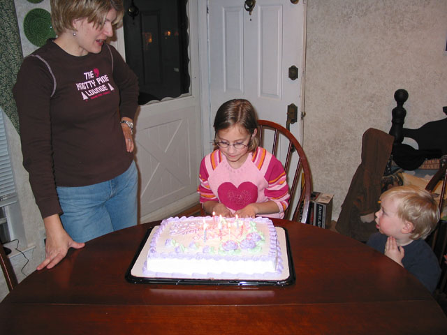 Holly psyching herself up to blow out all 8 candles