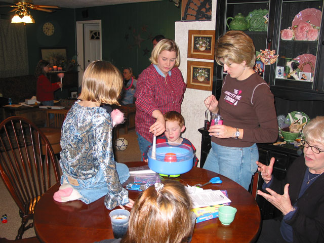 The first batch of cotton candy is being made