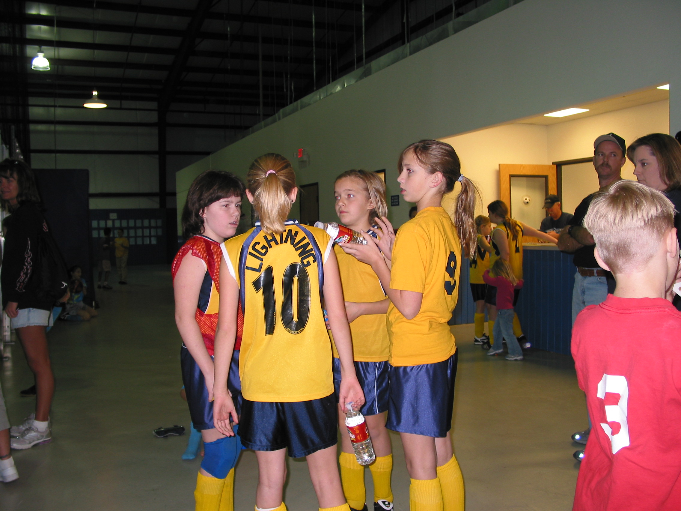 Slayder, Macie, Lulu, and Holly discuss strategy.
