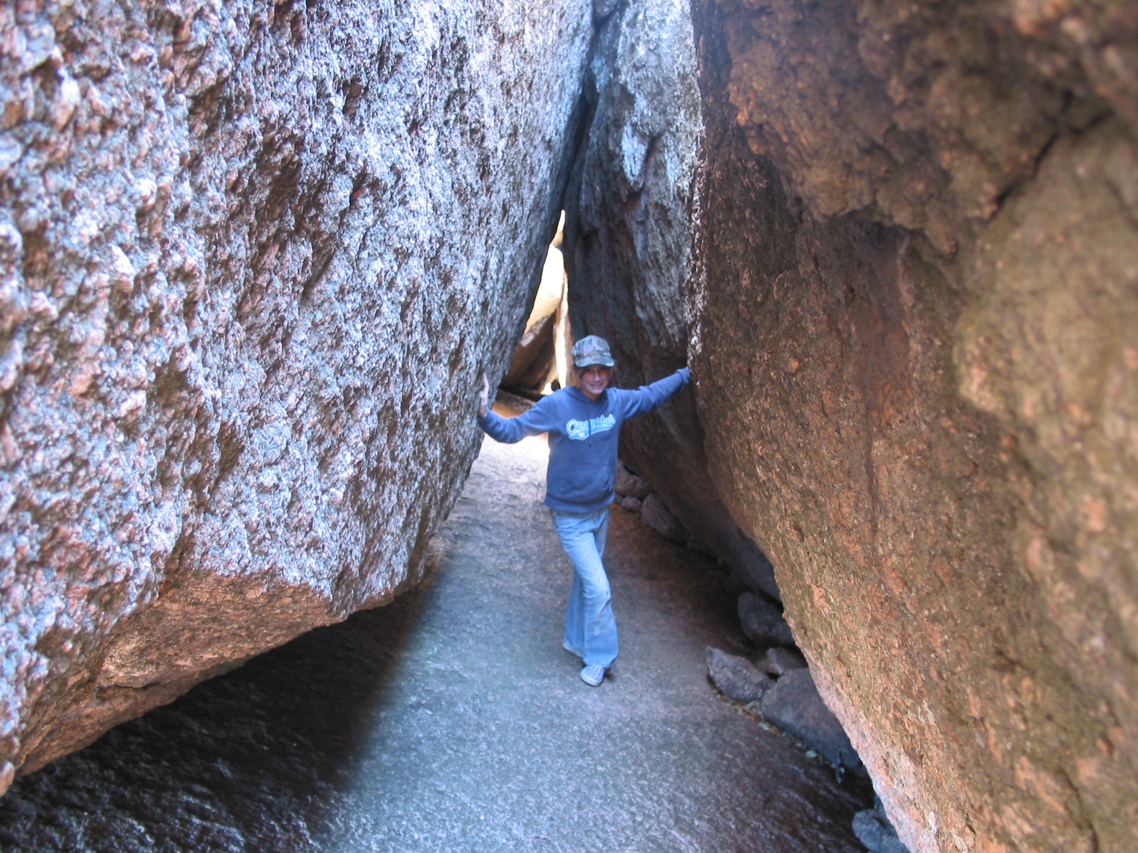 Holly amongst some big boulders
