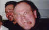 Wayne on a plane (may not actually be doctored).jpg (21904 bytes)