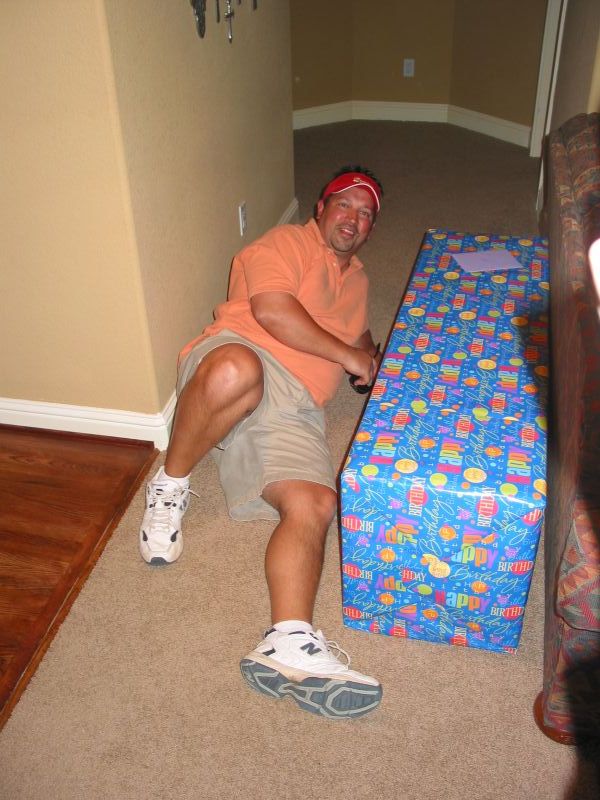 Bruce lies beside his giant present.