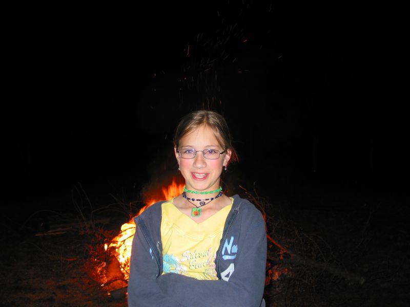 I wanted a silhouette of Holly against the fire but I accidentally left the flash on.