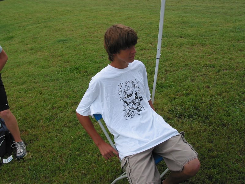 Ace shows off one of his new shirts from last night's auction