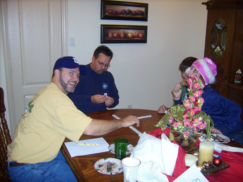 Joey, Bruce, Andrew, and Holly play dominoes for real