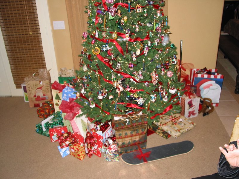 A replenished pile of gifts under the Armstrong Christmas tree-1