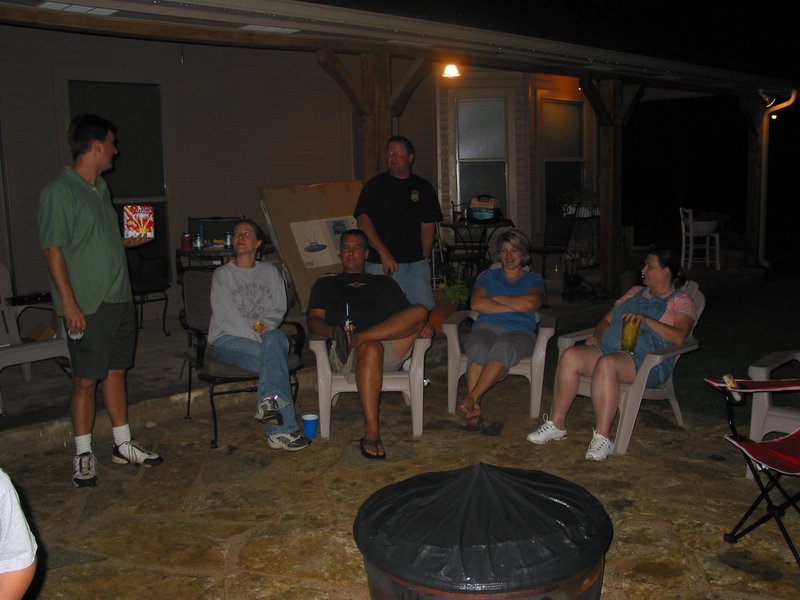 The neighbors prepare to watch the show