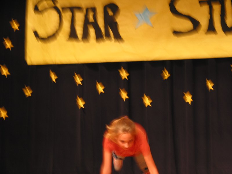 The photographer is too slow to catch Macie's dive to the stage