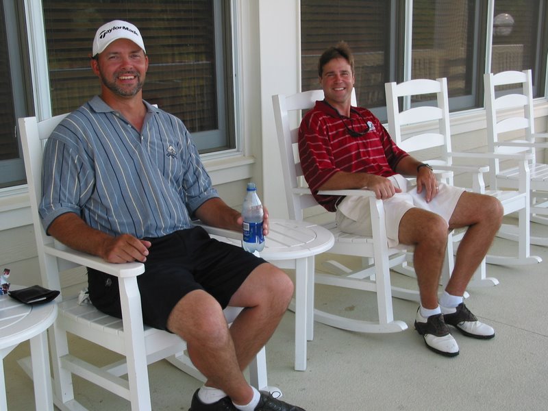 IMG 3659 - TPC - Joey and Timmy relax on the porch of the fabulous clubhouse
