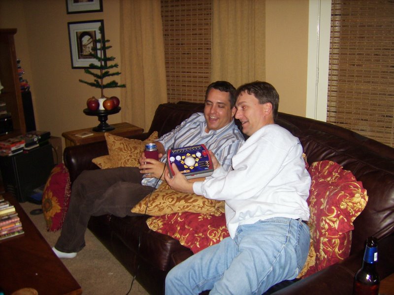 Ed and Leigh watch proudly display the home version of 'Golden Tee' golf