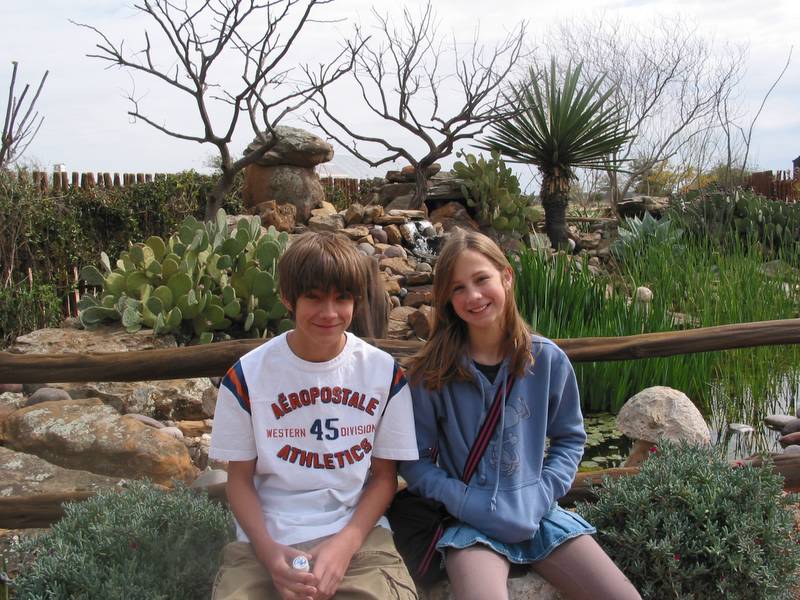 Andrew and Holly complaining about always having to squint into the sun to be photographed