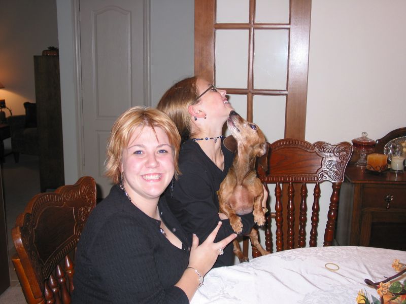 Whitney just misses seeing Deanie lick some Thanksgiving gravy off of Holly's face